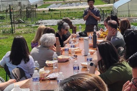 Lafayette Staff enjoying lunch outdoors at LaFarm